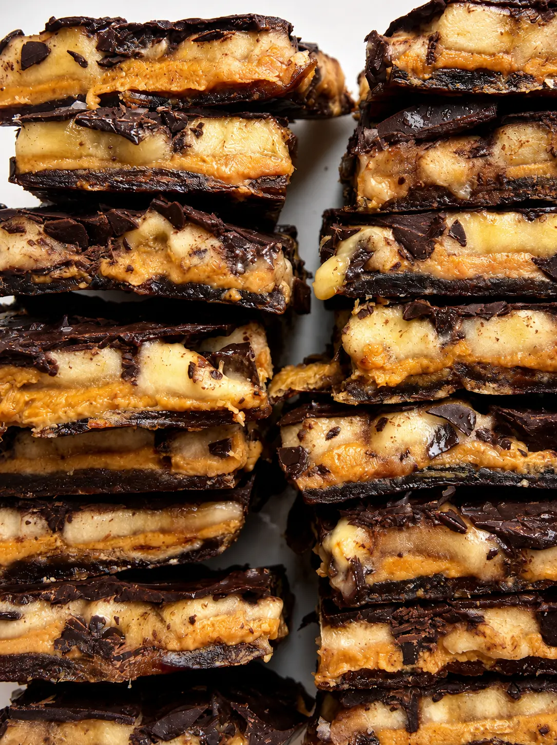 Close-up of banana frozen date bark layers with peanut butter and dark chocolate